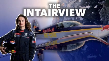Rally Car Driver Tries to Survive Interview While Upside Down in Red Bull Stunt Plane