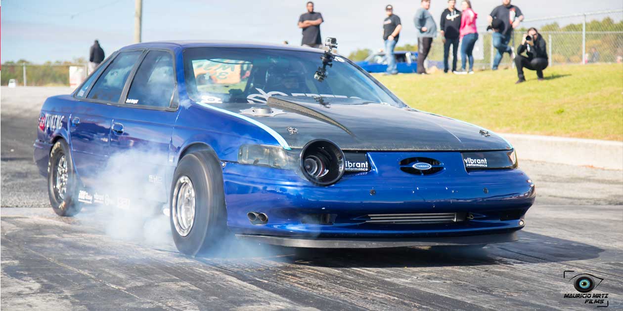 Ford Taurus SHO Runs an 8-Second Quarter Mile, Loses Hood in the Process