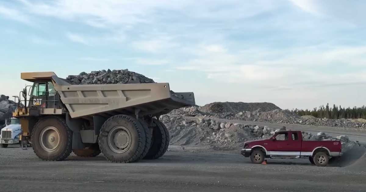 CAT 777 Rolls Over F-150 Like it's not Even There
