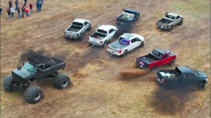 How Many Trucks Will it Take to Beat a Duramax Powered Monster Truck in Tug-of-War?