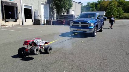 Small but Mighty Remote Control Car Pulls Full Size Truck, Seemingly With Ease!