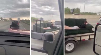 Kid Rides Couch Down Crowded Highway, Where Are His Parents!?