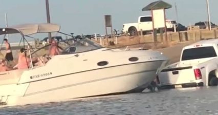 Boat Owner Clobbers the Back of His Truck Trying to Load at Boat Ramp