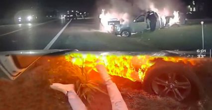 VIDEO: Michigan officer saves woman trapped in burning truck