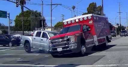 Wild Video, Truck Slams Into Ambulance Carrying Patients